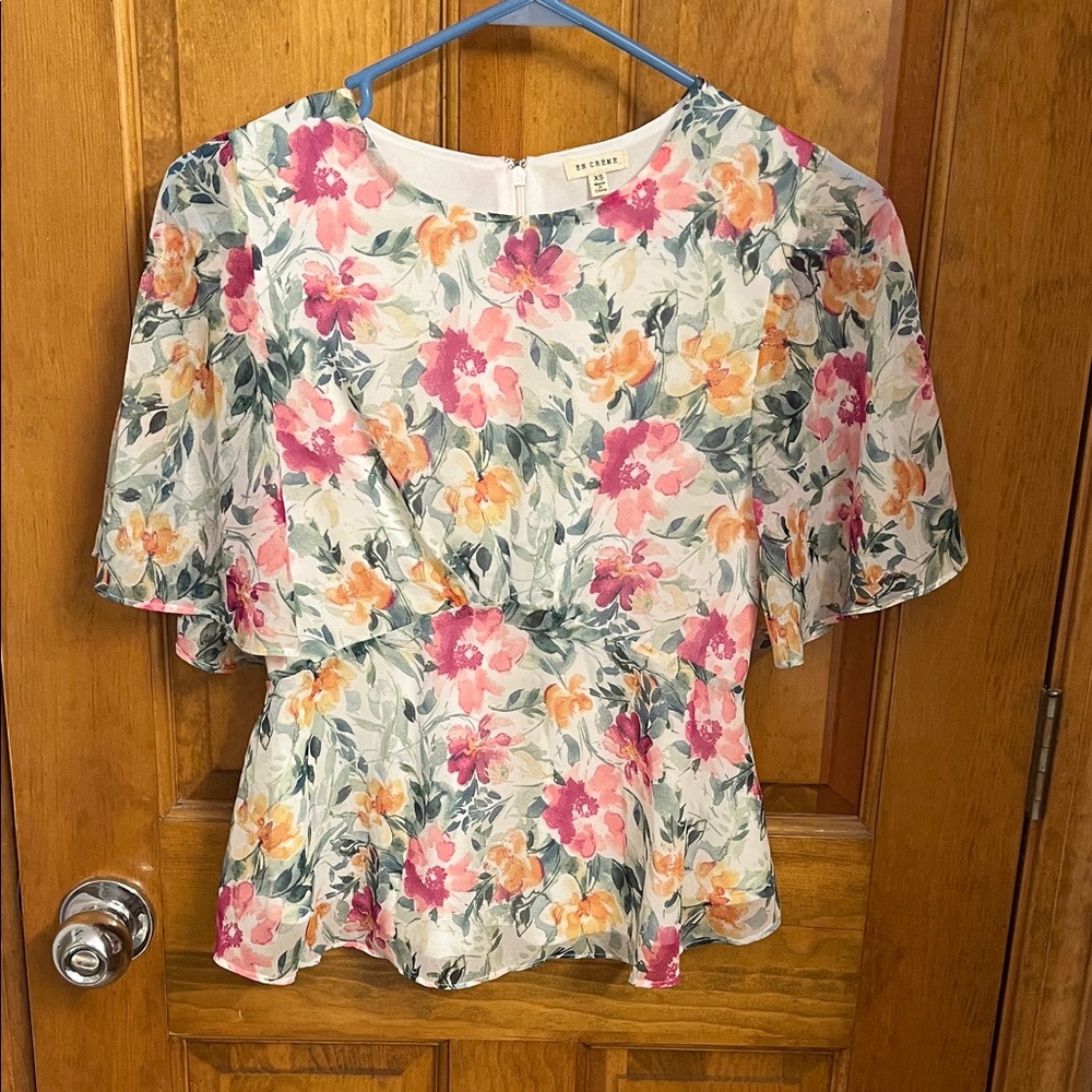 Floral shirt. Size xsmall. Silky blouse material. Barely worn!